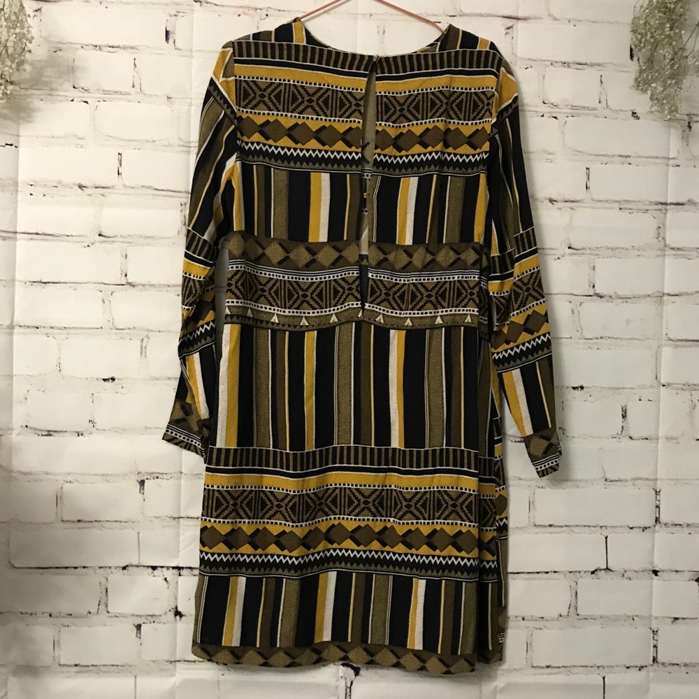 Beautifully patterned dress.